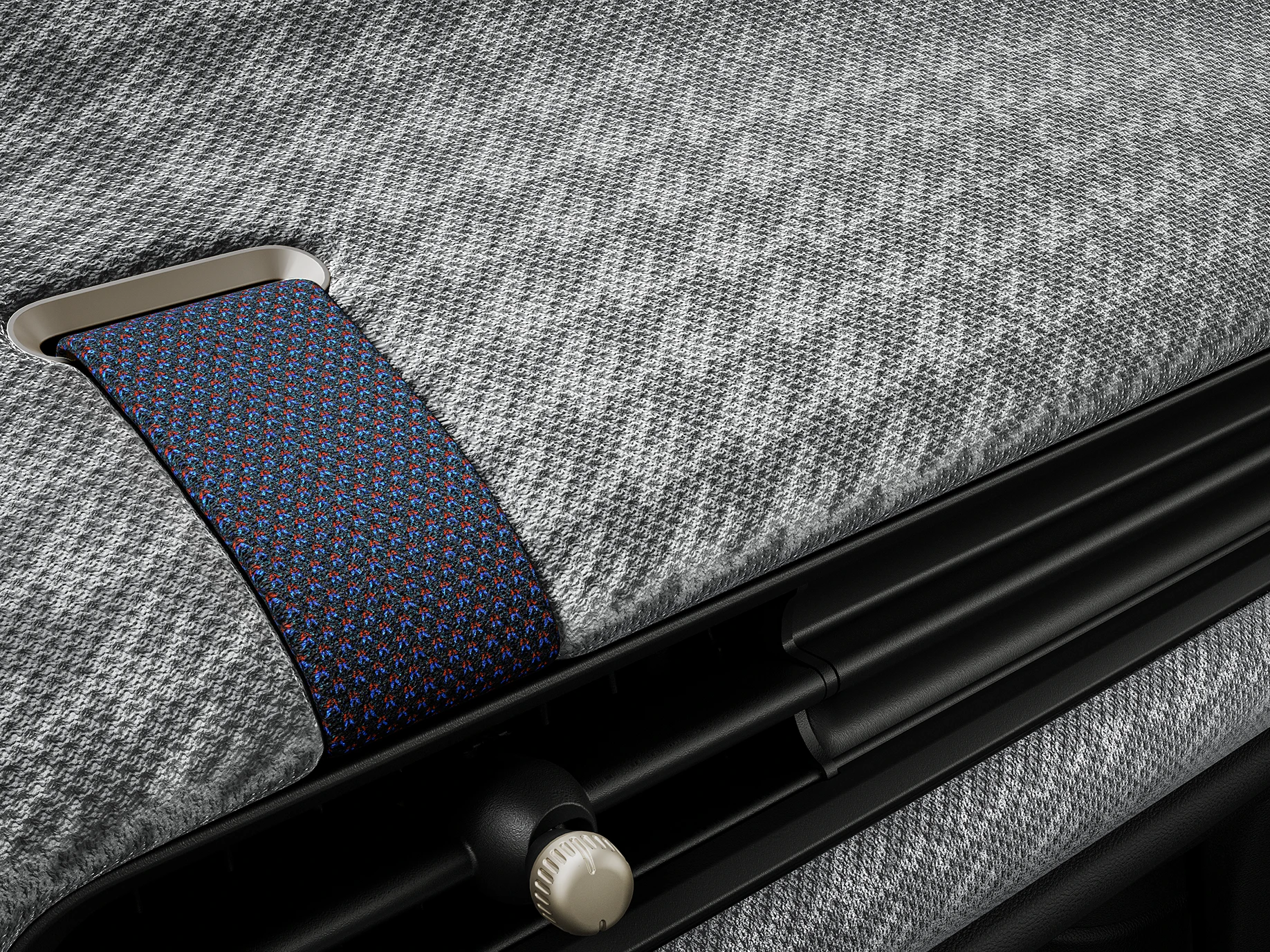 Vista ravvicinata della plancia con finitura in tessuto tecnico 2D all'interno della MINI Cooper.