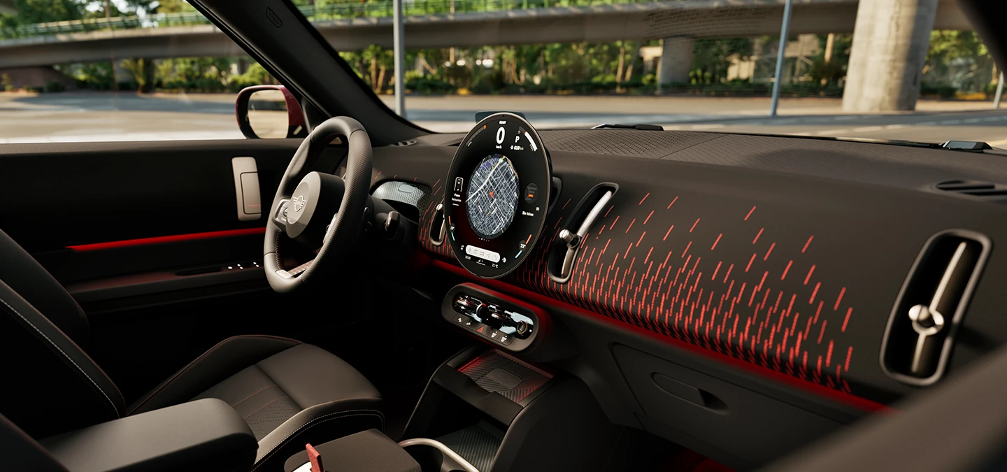 Vista interna laterale del cruscotto della MINI Countryman con finiture John Cooper Works.