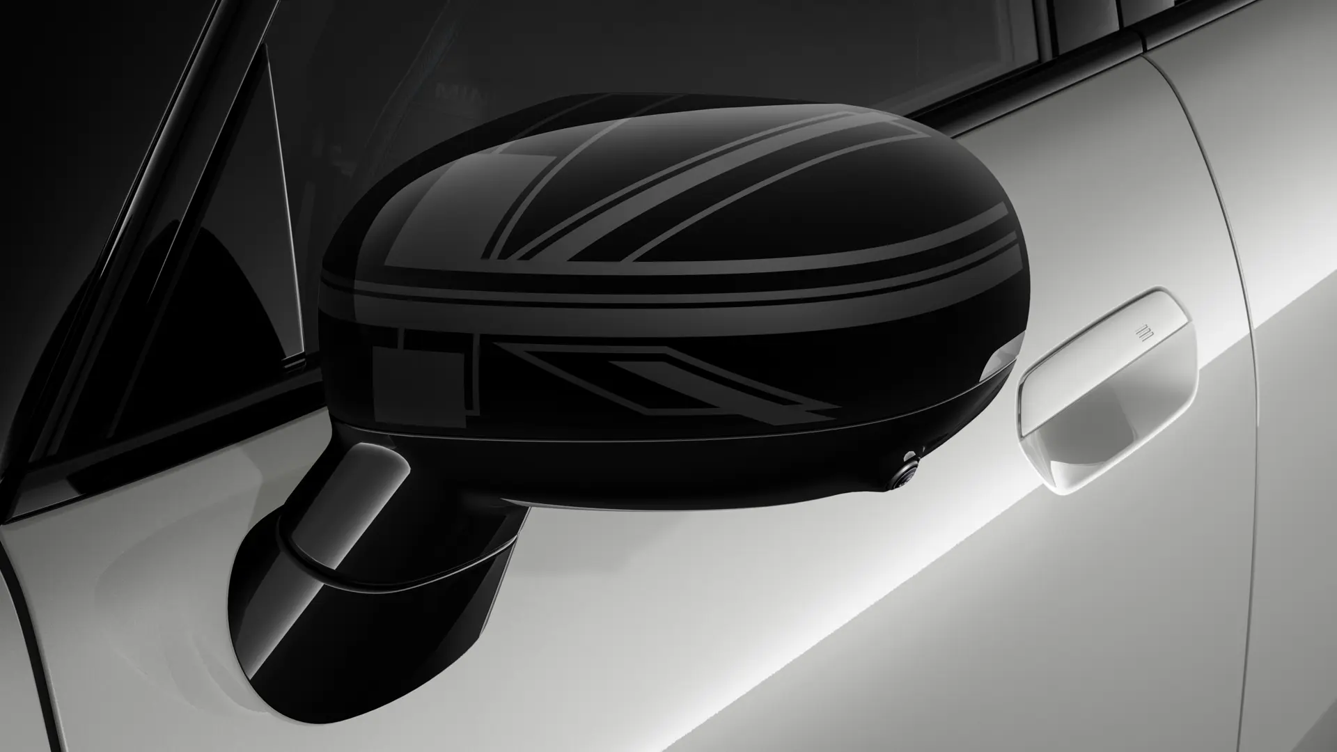 MINI Cooper a 3 porte in argento con guscio retrovisore esterno in design Night Union Jack.